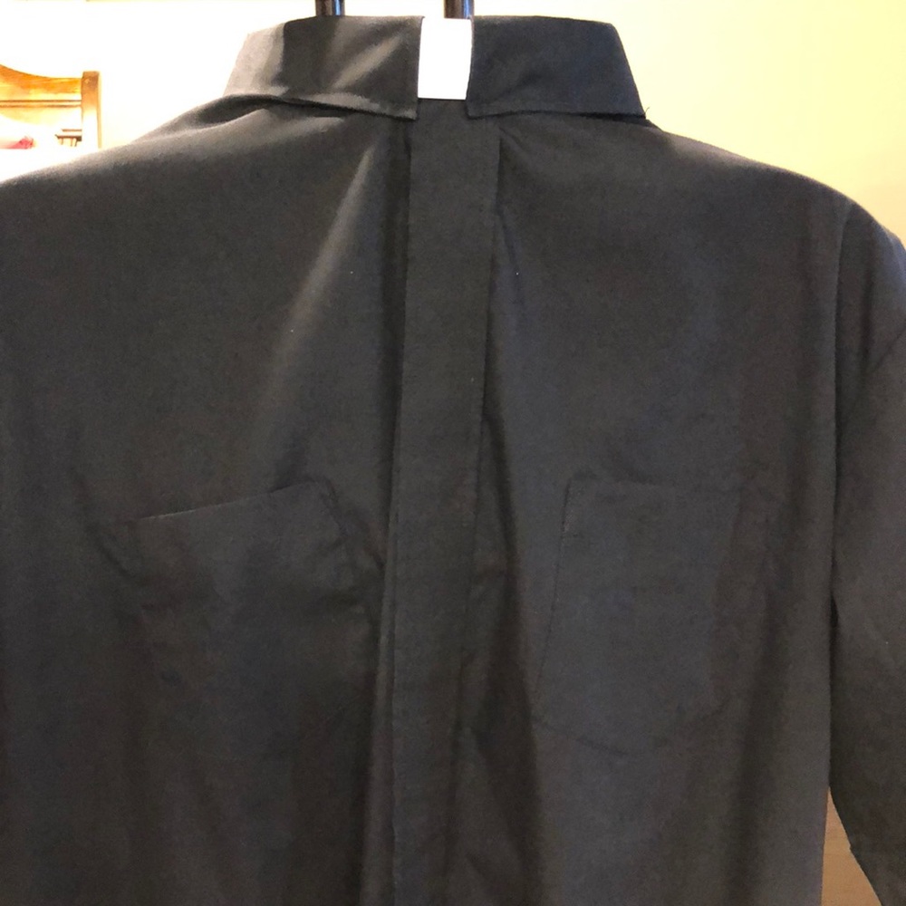 R. J. Toomey brand clergy shirt. Black in color size 18 1/2 sleeve 34/35